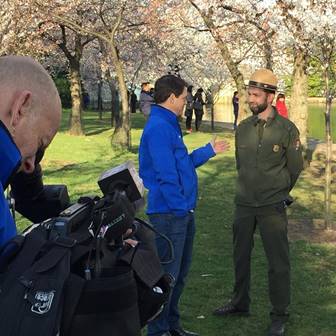 Film crew interviewing a national park service ranger