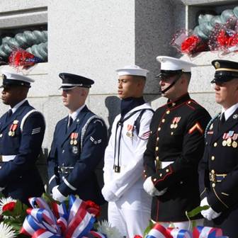 Servicemembers in dress uniform